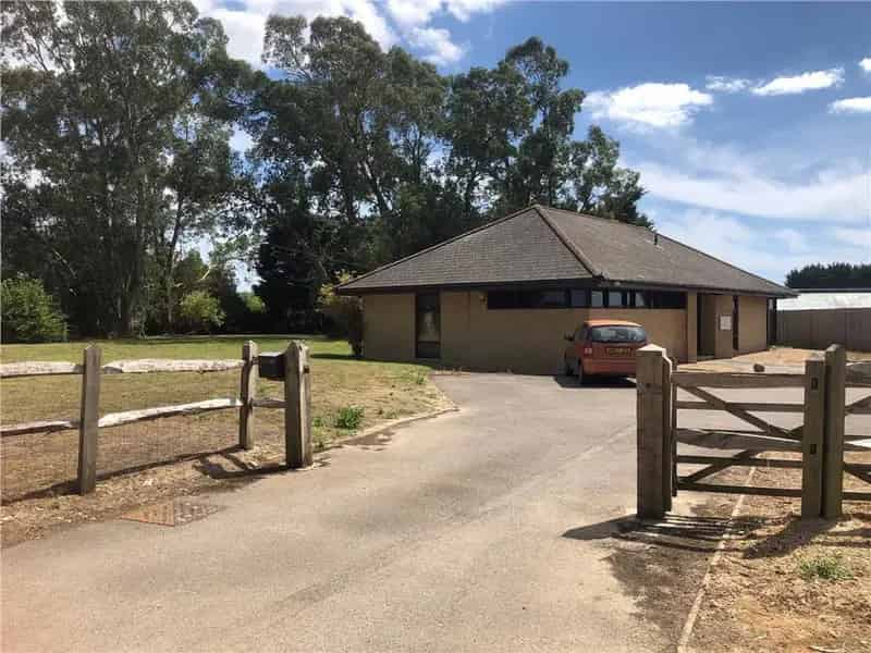 Modern Detached Office Building with Ample Parking and Landscaping