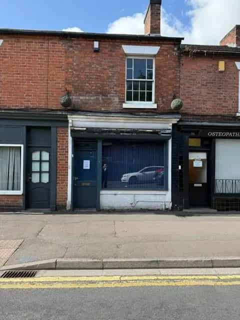 Two-Story Building with Shopfront and Office Space