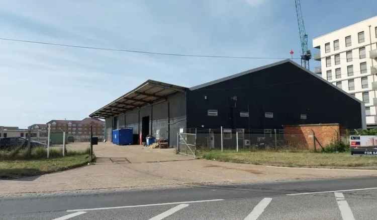 Steel-Framed Warehouse with Canopy and Yard
