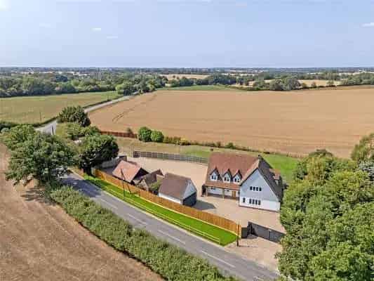 5-Bedroom Country House with Outbuildings and Acre of Land