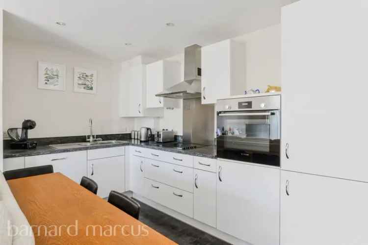 2-Bed House with Open-Plan Living and Two Patios