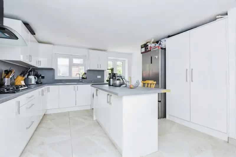 Four Bedroom Extended Mid Terraced House