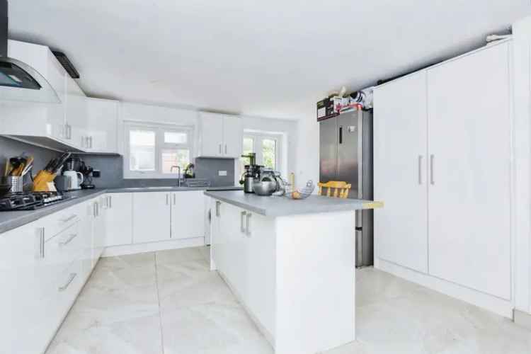 Four Bedroom Extended Mid Terraced House