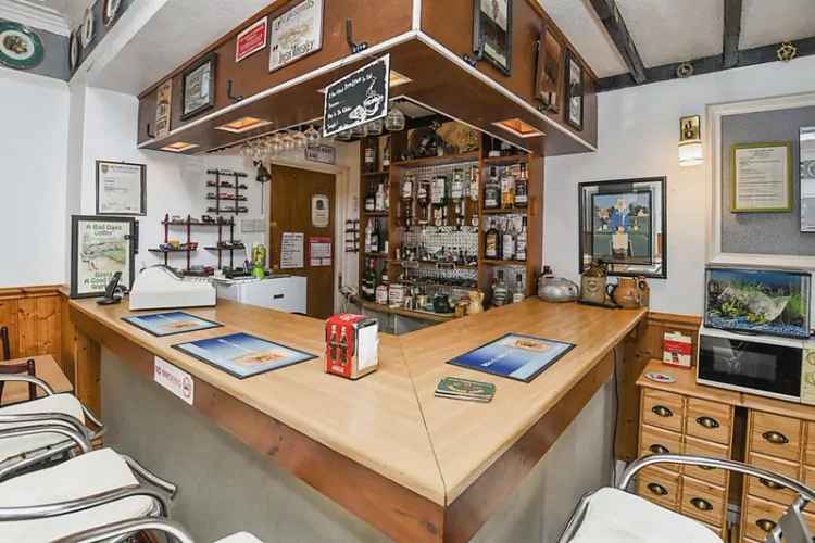 8 Bed Guest House with 5 Chalets and Owners Accommodation