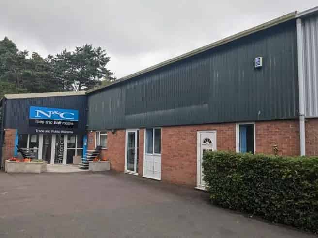 Industrial Warehouse Unit with Mezzanine Storage and Parking