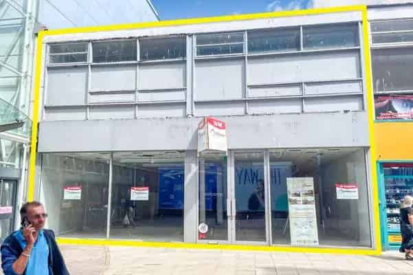 Two-Story Building with Ground Floor Shop and Upper Parts for Sale