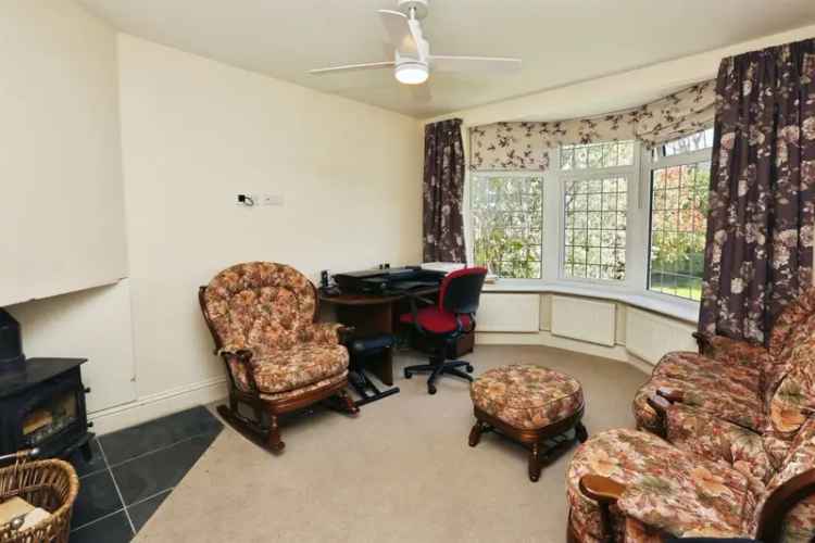 Four-Bedroom Chalet Bungalow with Driveway Parking and Enclosed Garden