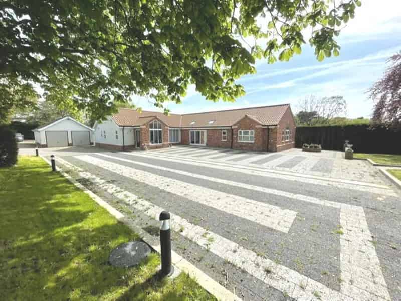 Spacious 4-Bedroom Detached Bungalow with Ensuites and Garage
