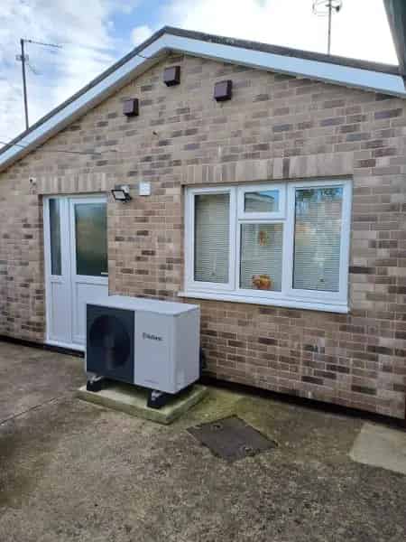 Energy Efficient Bungalow Renovation New Windows Heating Cladding
