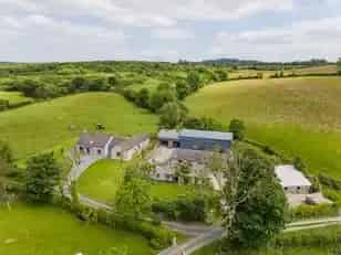 Modern Family Home with Farm Buildings and 21 Acres
