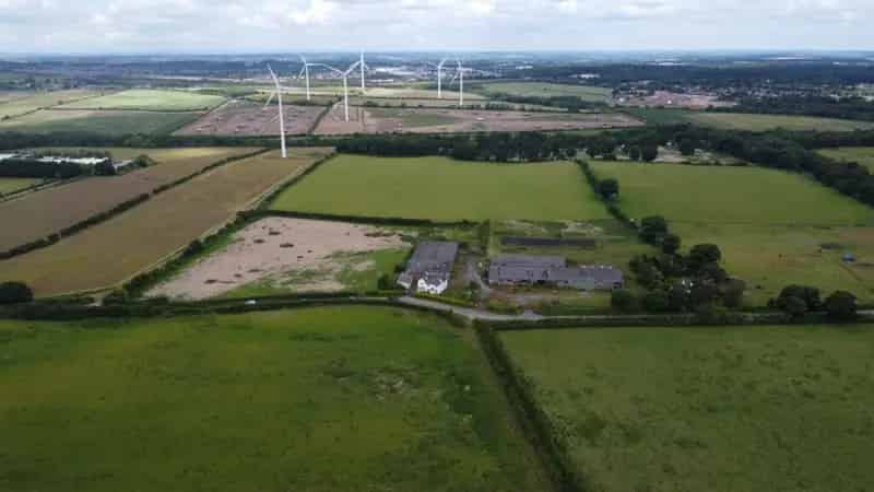 155.10 Acre Residential Farm with Farmhouse and Extensive Buildings