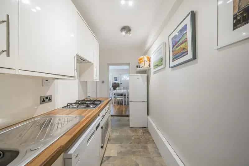 Charming 1-Bedroom Flat with Private Garden for Sale