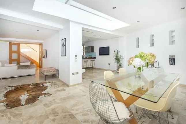 Detached house to rent in Somerset Road, London SW19