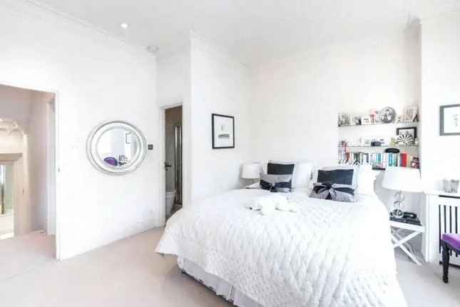 Terraced house to rent in Peterborough Road, London SW6