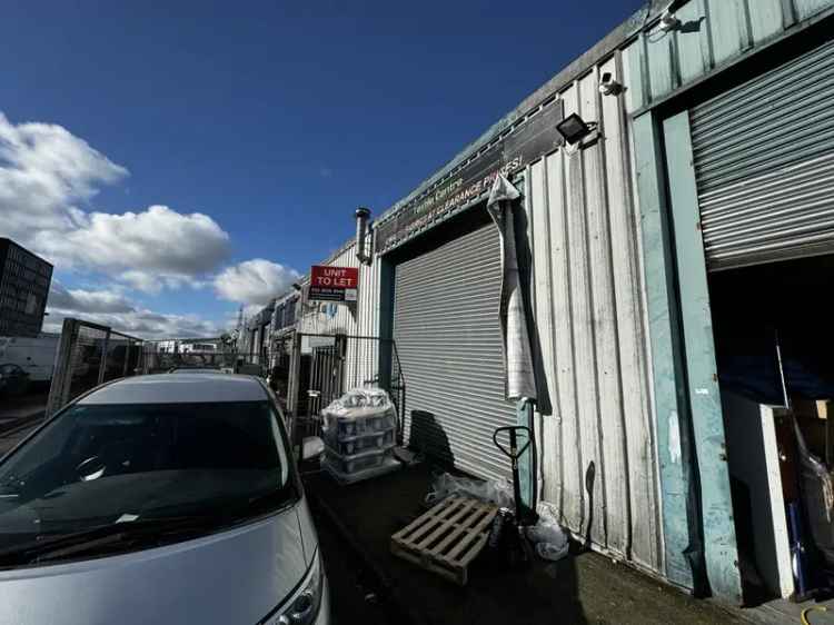 Mid-Terrace Warehouse with Offices and Loading Area