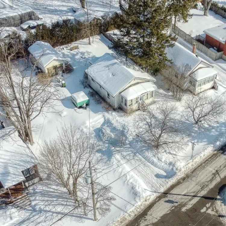 Large Lot for Sale Near REM in Deux-Montagnes