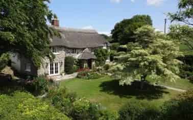 Grade II Listed Cottage with Stunning Gardens and Panoramic Views