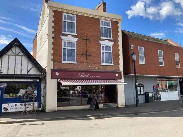 Refurbished Shop with Vacant Upper Floors - Redevelopment Opportunity