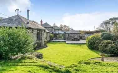 Charming Character Property with Multiple Garages and Large Garden