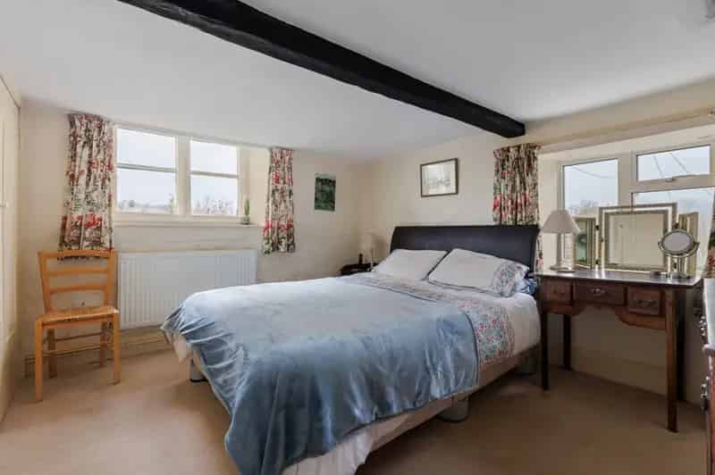 Cotswold Stone Cottage For Sale - Character Home with Garden and Potential