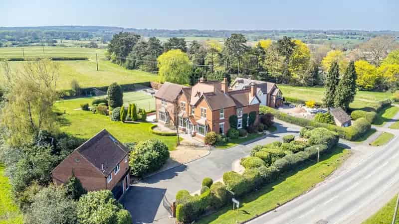 Grand 6-Bedroom Country Home with Tennis Court and Detached Studio