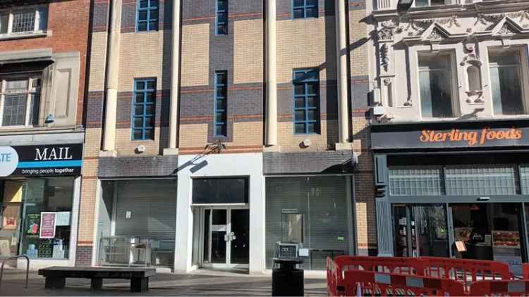 Three Story Commercial Building with Rooftop Terrace