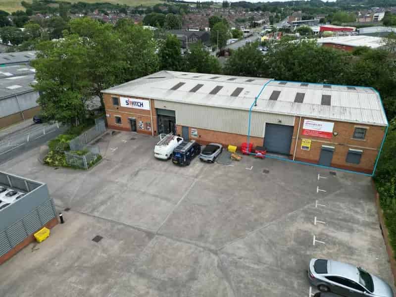 Modern Semi-Detached Warehouse Unit with High Eaves and Ample Yard Space