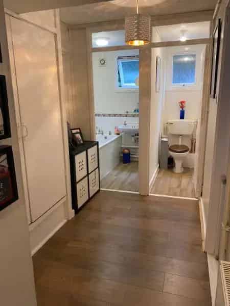 Spacious 2-Bed Ground Floor Flat with Private Garden in Quiet Woodland Setting