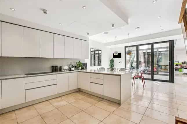Four Bedroom Townhouse for Sale in Warriner Gardens SW11