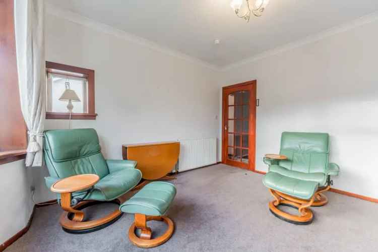 Spacious Detached Bungalow with Extension Potential in Giffnock