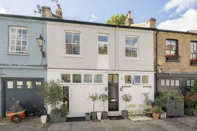 Terraced house for sale in Russell Gardens Mews, London W14