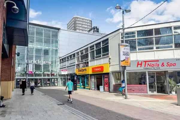 Two-Story Building with Ground Floor Shop and Upper Parts for Sale