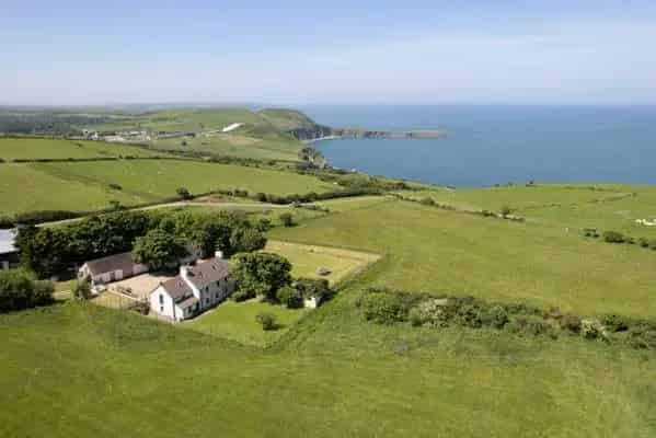 Coastal Farmhouse with Sea Views and Barn Conversion Potential