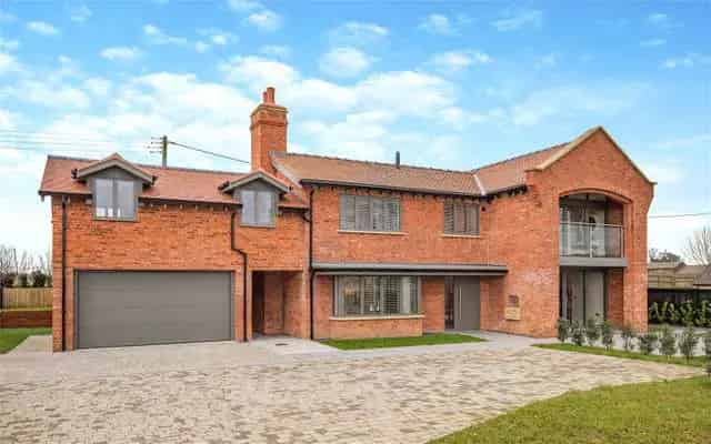 New Build Four-Bedroom Family Home with High-Spec Finish and Private Gardens