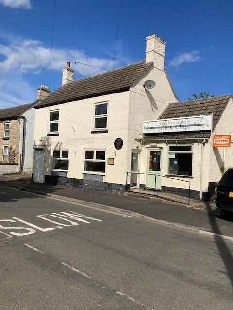 Freehold Retail Units & 2-Bed Flat Investment Opportunity