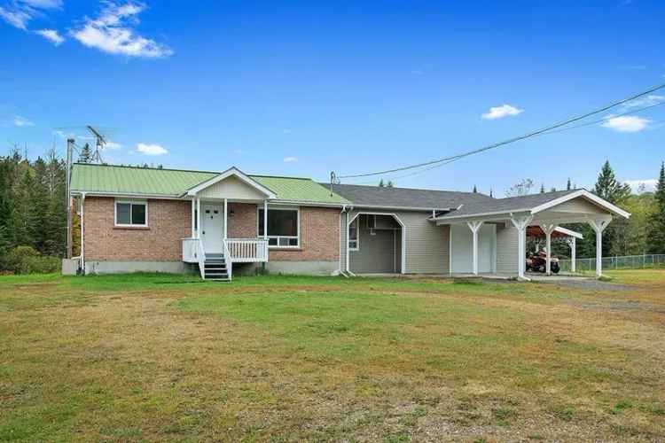 House for Sale: Large Bungalow on 2 Acres with Workshop and Greenhouse