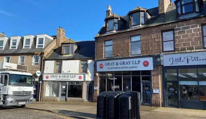 Interconnected Mid-Terraced Properties with Retail and Office Space