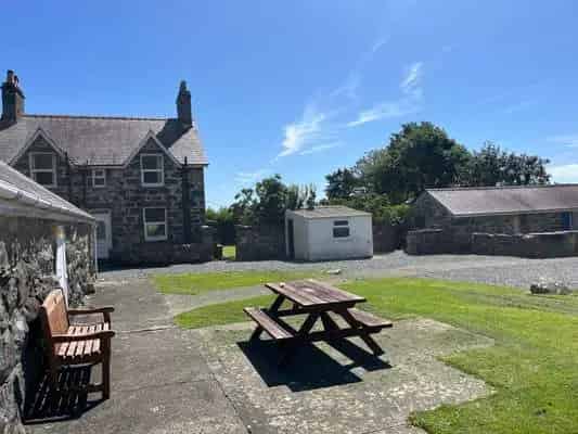 Ynysgain Bach Property: Farm Cottage, House and Barn with Campsites