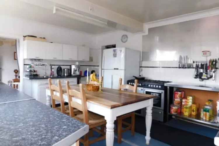 10 Bed Guest House with En-Suite Rooms and Holiday Let Potential