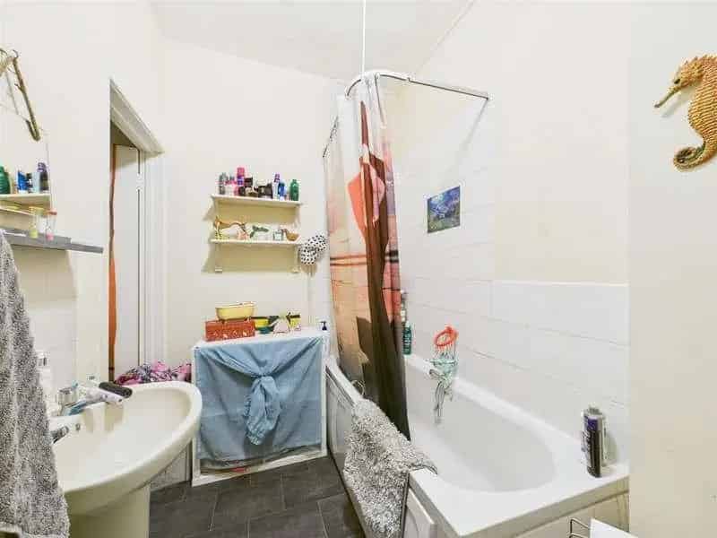 3 Flats & Shop Investment Property with Coastal Views