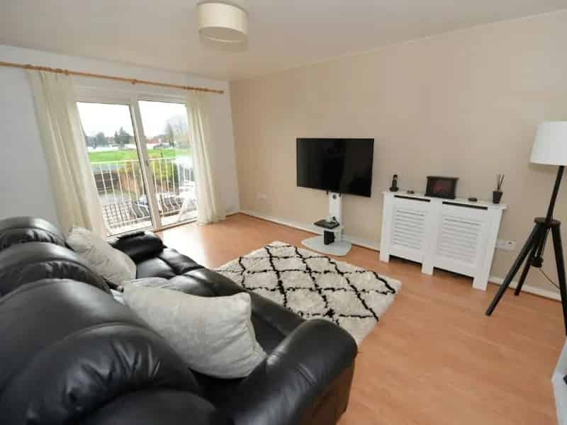 Spacious Apartment with Balcony and Parking Near City Center