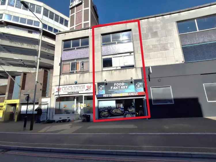 Mid-Terraced Building with Shopfront and Storage