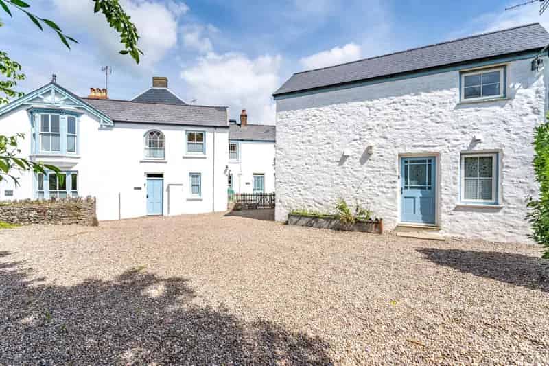 Manorbier Cottages: Coastal Retreat with Income Potential