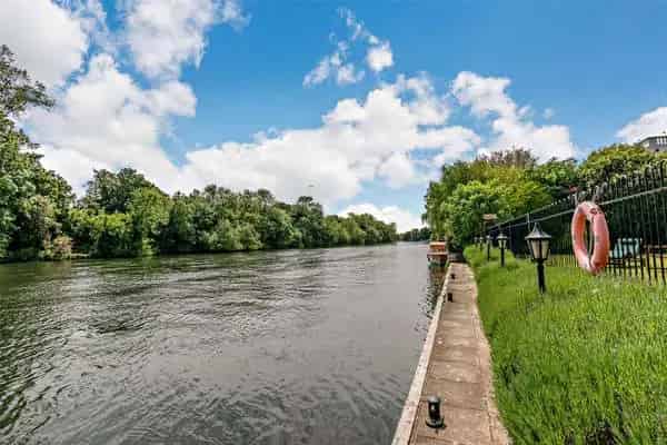Riverside Property with Stunning River Views and Heated Pool
