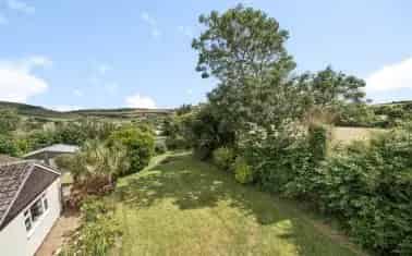 Spacious Detached Bungalow with Secluded Gardens and Character Features