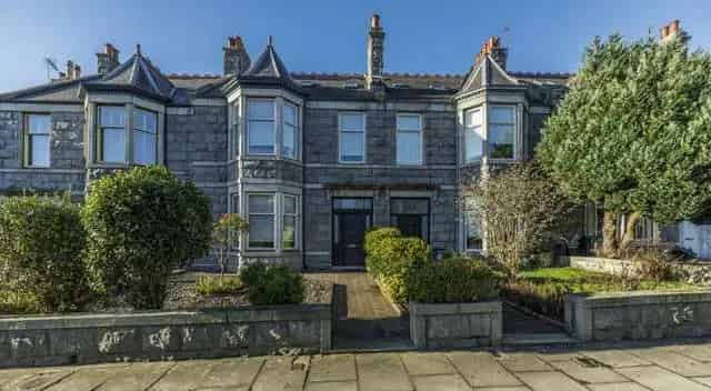 Spacious 3-Floor Family Home with Modern Amenities and Charming Features