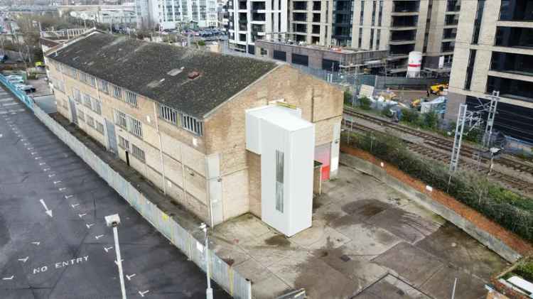 Three Story Warehouse with Loading Docks and Parking