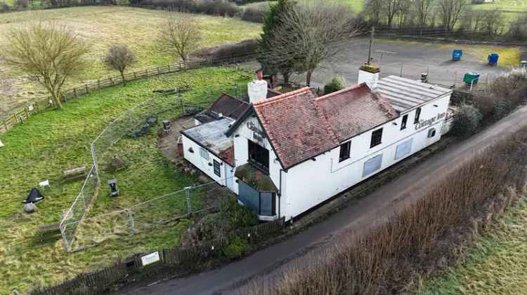 Fire Damaged Pub on 5.38 Acres For Sale