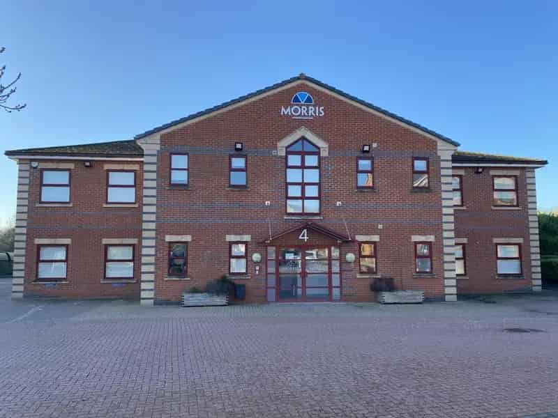 Modern Detached Office Building with Ample Parking and Flexible Space
