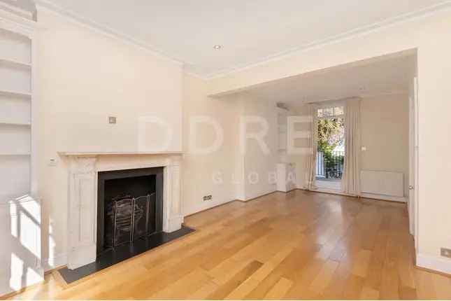 Terraced house for sale in Pembroke Square, London W8